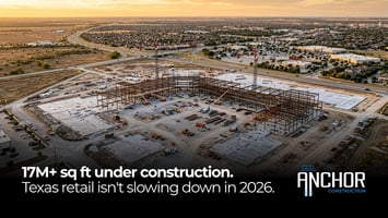 Retail construction site in Texas 2026; steel framework and crane at commercial development