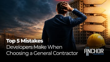 developer reviewing construction plans with general contractor